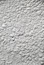 Textured stucco background with scratches. uneven plaster backdrop Royalty Free Stock Photo