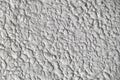 Textured stucco background with scratches. uneven plaster backdrop Royalty Free Stock Photo