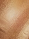 Golden fleecy fabric texture of tablecloth Royalty Free Stock Photo