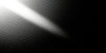 Textured surface illuminated by a diagonal beam of light Royalty Free Stock Photo