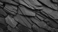 Textured surface of light rough black slate stones for background or decorative design Royalty Free Stock Photo
