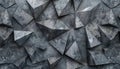 Textured gray concrete wall featuring modern geometric patterns and angular shapes Royalty Free Stock Photo