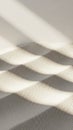 Soft Textured Surface with Geometric Light Shadows and Subtle Ripples Creating a Minimalist and Serene Abstract Background with Royalty Free Stock Photo