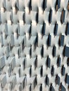 Textured surface of wall. Metallic modern lattice wall. Abstract gray blue background. Geometric backdrop. Vertical