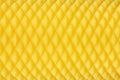 Textured surface yellow candle