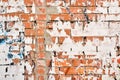 Textured torn poster paper against a rustic brick wall backdrop Royalty Free Stock Photo