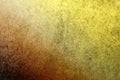 A textured vintage stucco background with a dark blue to golden yellow gradient Royalty Free Stock Photo