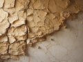 Textured wall with cracked golden plaster Royalty Free Stock Photo