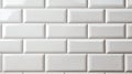 A textured wall featuring rectangular, glossy white tiles arranged in a horizontal brick-like pattern Royalty Free Stock Photo