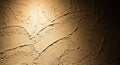 Textured wall featuring a rough plaster surface with irregular patterns. The plaster is a warm Royalty Free Stock Photo