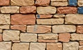Textured Wall Made Of Varied Sandstone Bricks masonry Royalty Free Stock Photo