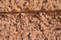 Textured wall of Mud brick house in Sudan.