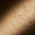 Textured wall with a rough, irregular Royalty Free Stock Photo