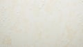 Textured Wall Surface with Subtle Patterns and Soft Color Tones