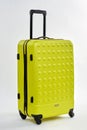 Textured wheeled luggage bag.