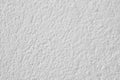 Textured white wall detail. Abstract background. Copy space. Royalty Free Stock Photo
