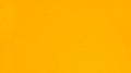 Textured yellow plastic close-up. Plastic texture. Blank, clean plastic background. Royalty Free Stock Photo