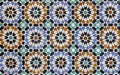 Textures of ancient moroccan ceramic mosaic with geometric and floral pattern Royalty Free Stock Photo