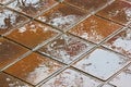 Textures and Colorful Brown and Golden Reflections on Tiles Royalty Free Stock Photo