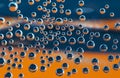 Textures of orange and blue air bubbles in water Royalty Free Stock Photo