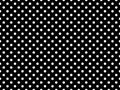 texturised white color polka dots over black background