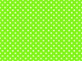 texturised white color polka dots over chartreuse green backgrou Royalty Free Stock Photo