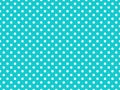 texturised white color polka dots over dark turquoise cyan backg