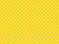 texturised white color polka dots over gold yellow background