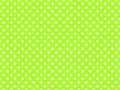 texturised white color polka dots over green yellow background