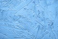 Texturized blue putty. Vintage background of venetian stucco texture. Monochrome abstract background. Close-up Royalty Free Stock Photo