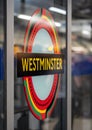 TFL roundel on platform at Westminster underground station. London UK