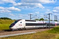 A TGV inOui high speed train in the countryside Royalty Free Stock Photo
