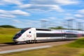 A TGV inOui high speed train with motion blur Royalty Free Stock Photo