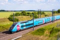 A TGV Ouigo high speed train in the countryside Royalty Free Stock Photo