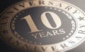 10th anniversary, golden stamp over black background. Ten years celebration card Royalty Free Stock Photo