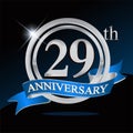 29th anniversary logo with blue ribbon and silver ring, vector template for birthday celebration