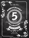 5th-anniversary logo &pattern with floral ornament, geometric wreath, and ribbon on a chalkboard. Vintage concept background. Royalty Free Stock Photo