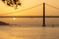 25th of April Bridge - Sunset over Tagus river in Lisbon Royalty Free Stock Photo