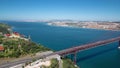 25th of April Suspension Bridge over the Tagus river, connecting Almada and Lisbon in Portugal timelapse Royalty Free Stock Photo