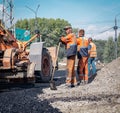 30th of August, Russia, Tomsk, road workers repair roadbed