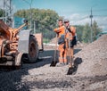 30th of August, Russia, Tomsk, road workers repair roadbed