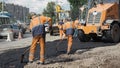 30th of August, Russia, Tomsk, road workers repair roadbed