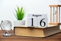 16th august - sixteenth day month calendar concept on wooden blocks