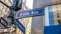 5th ave and E44 corner. Blue color street signs, Manhattan New York downtown Royalty Free Stock Photo