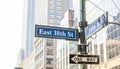 5th ave and E38 corner. Blue color street signs, Manhattan New York downtown Royalty Free Stock Photo