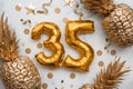 35th birthday celebration card with gold foil balloons and golden pineapples