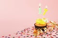 17th birthday cupcake with candle and sprinkles Royalty Free Stock Photo