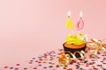 40th birthday cupcake with candle and sprinkles Royalty Free Stock Photo