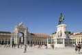 Arco da Rua Augusta, people and statue at Praca do Comercio in Lisbon