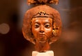 14th century BC statuette of queen Tiy with feather crown in Egyptian Museum